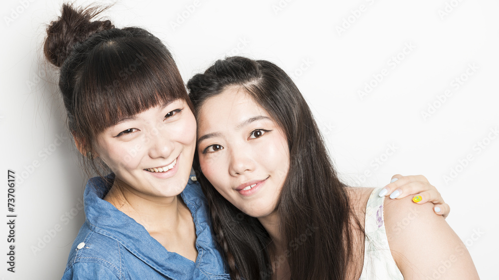 Two smiling asian girls Two smiling asian girls