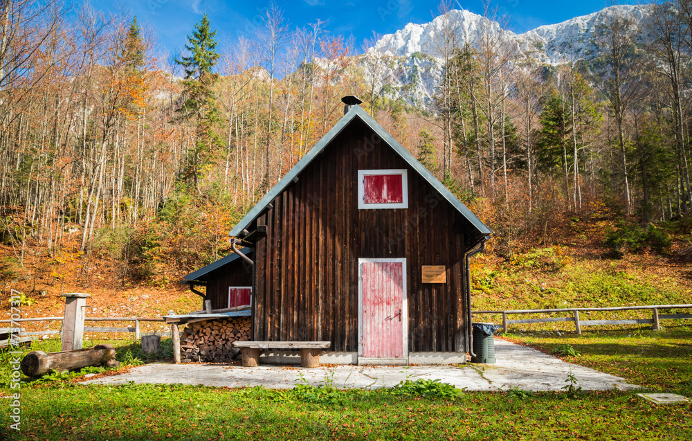 Alpine hut with a bench