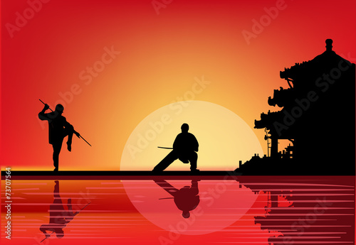 two fighting men near pagoda at sunset