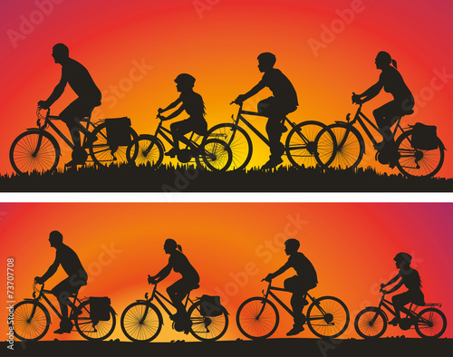 cyclists silhouettes on the background of sunsets