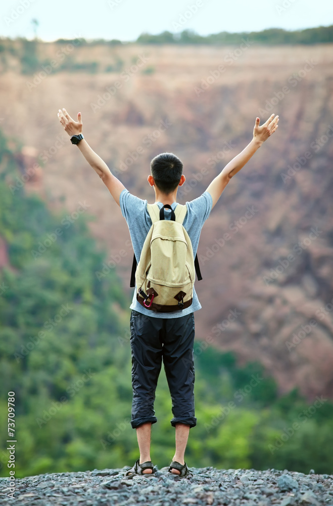 Man with raised hands