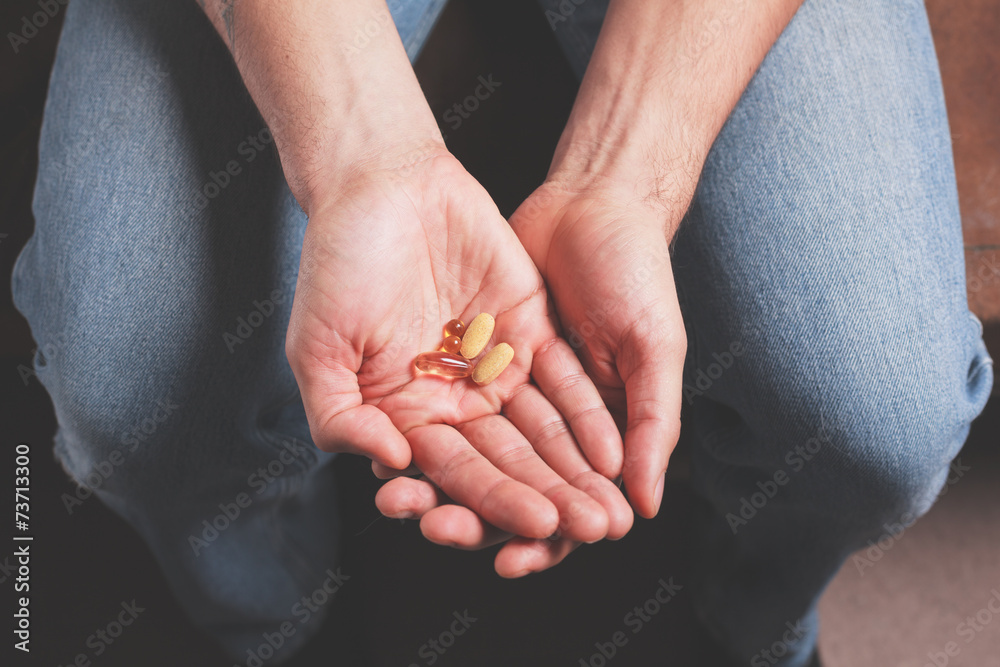 Obraz premium Hand with pills