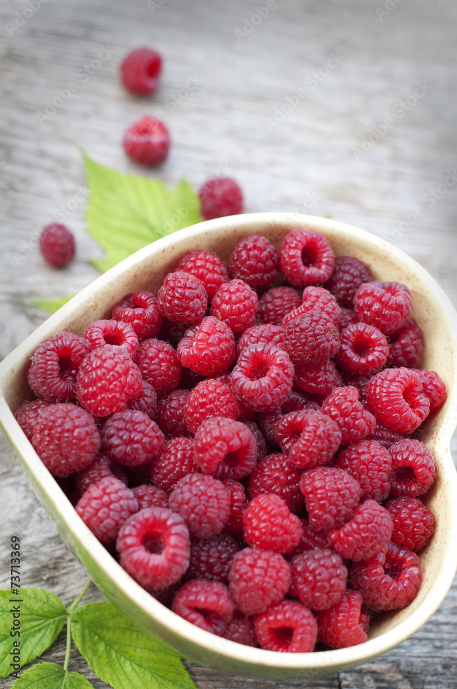 Raspberry in bowl in the form of heart Raspberry in bowl in the form of heart