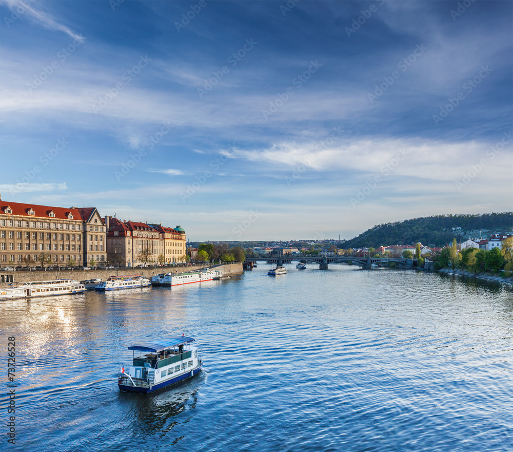 Fototapeta premium Tourist boats on Vltava river in Prague