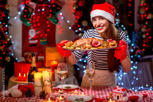 Woman preparing for Christmas dinner photo