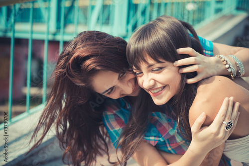 Obraz na plátně beautiful hipster young women sisters friends