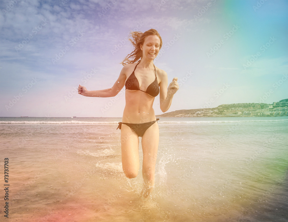 Girl running in the water