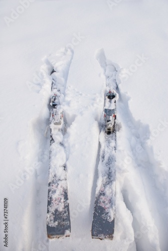 a pair of skis in the snow