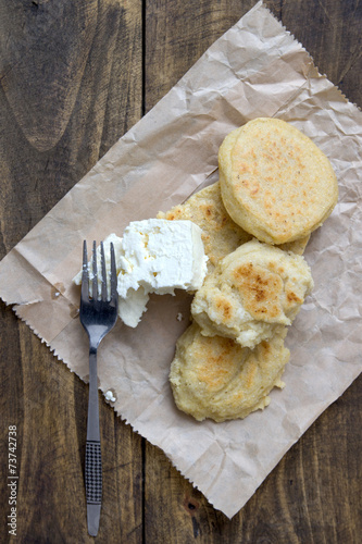 Freshly baked cornbread  and white  cheese photo