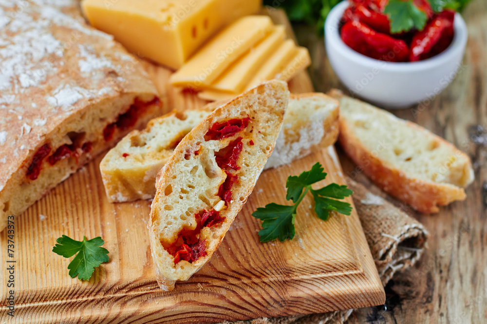 Fresh bread ciabatta with sun dried tomatoes Fresh bread ciabatta with sun dried tomatoes