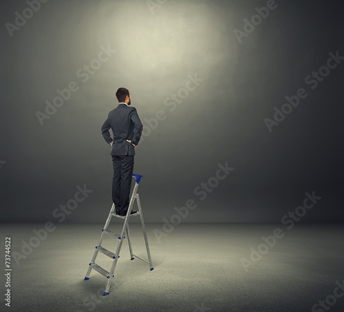 man standing on the stepladder