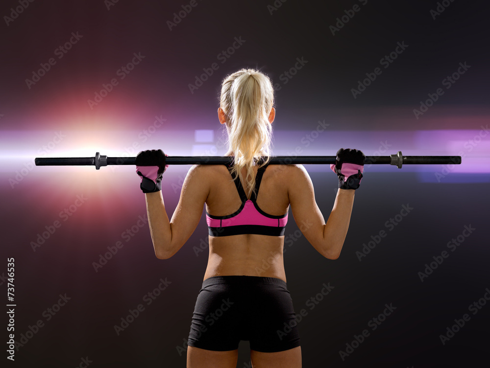 sporty woman exercising with barbell sporty woman exercising with barbell