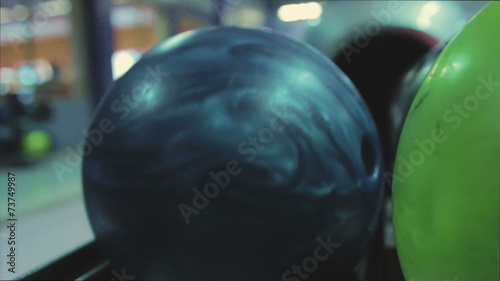 ball rolling bowls in a bowling alley