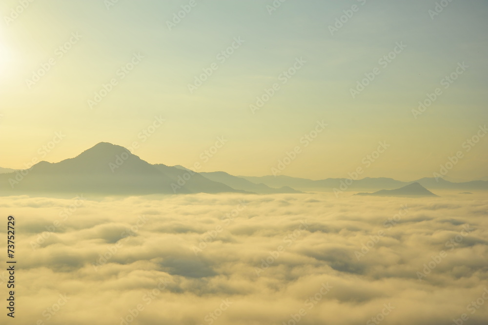 Mountain Landscape in the Mist at Sunrise Mountain Landscape in the Mist at Sunrise