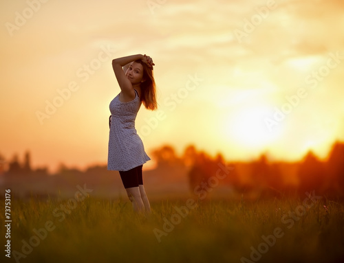 Girl against the sunset