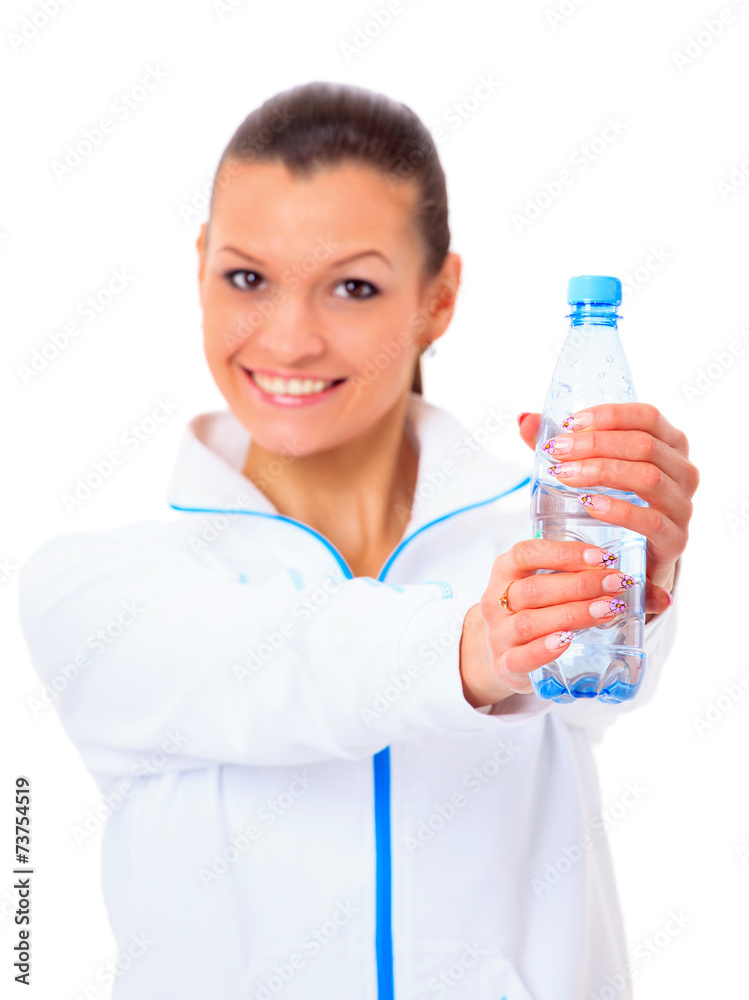 Beautiful fit mixed race female model holding a bottle of water Beautiful fit mixed race female model holding a bottle of water
