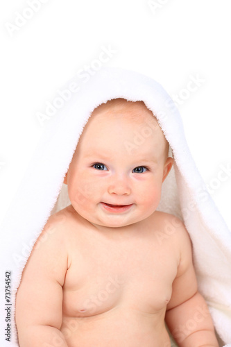 beautiful little baby on white towel