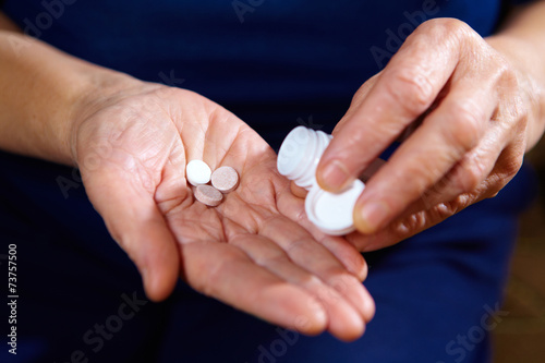Hands with pills
