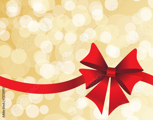 Golden background with a red bow