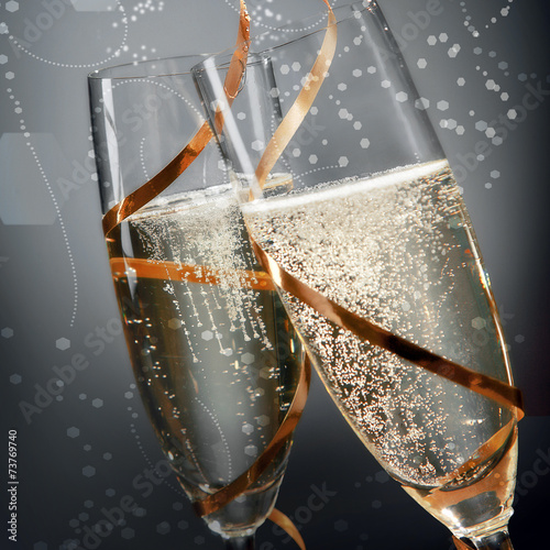 Photography Romantic flutes of sparkling golden champagne