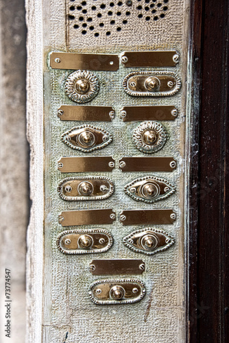 Vintage door bell buttons in a old apartment