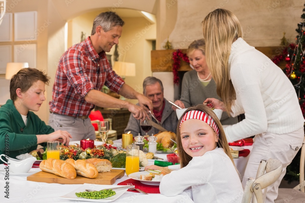 Three generation family having christmas dinner together