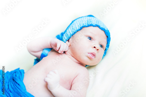 Cute newborn baby in a hat