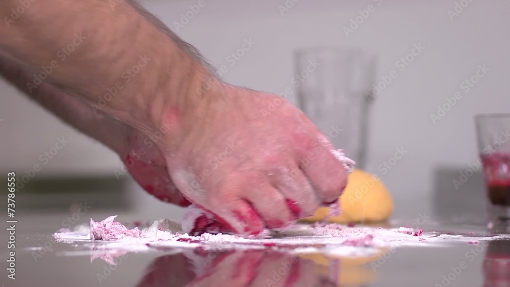 Ukrainian cuisine chef knead the dough with colorants Ukrainian cuisine chef knead the dough with colorants