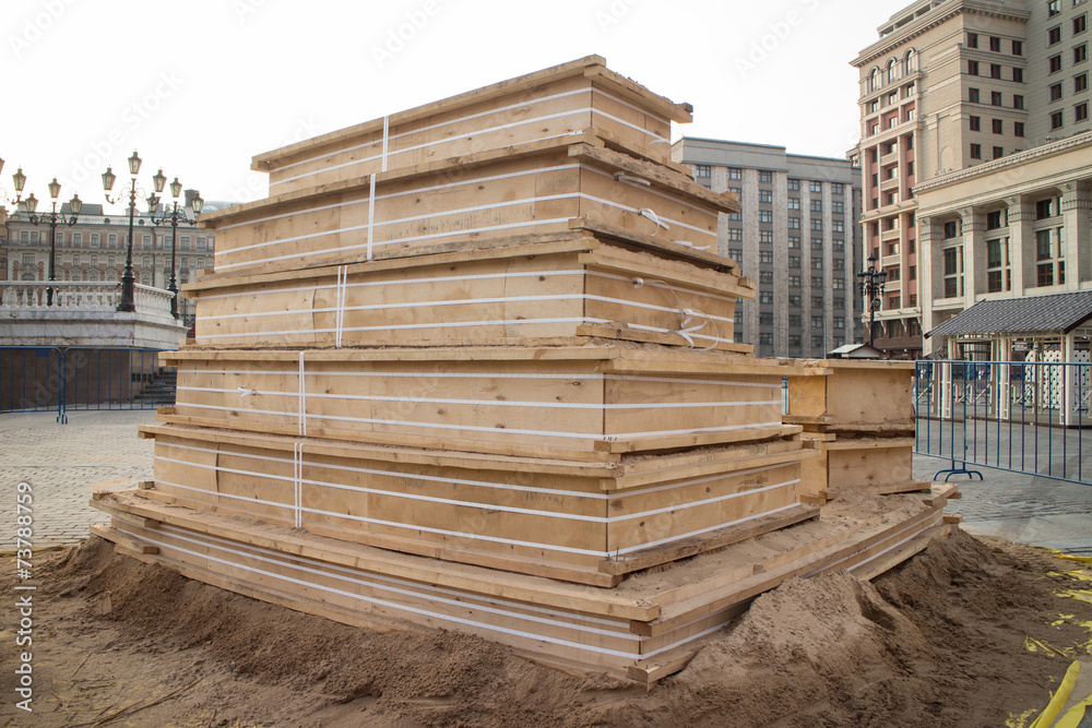 wooden piles on a pallet, used at the construction site wooden piles on a pallet, used at the construction site