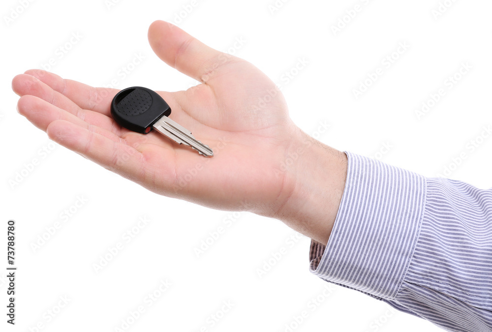 Businessman holding car key isolated on white Businessman holding car key isolated on white
