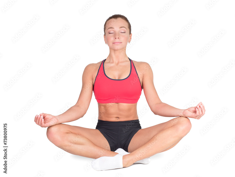 Young woman in a lotus position smiling. Relaxed woman Young woman in a lotus position smiling. Relaxed woman