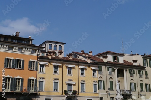 Colorful houses at a square in Brescia in Lombardy in Italy © Frouwina Harmanna va