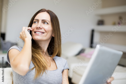 Young woman with tablet at ...