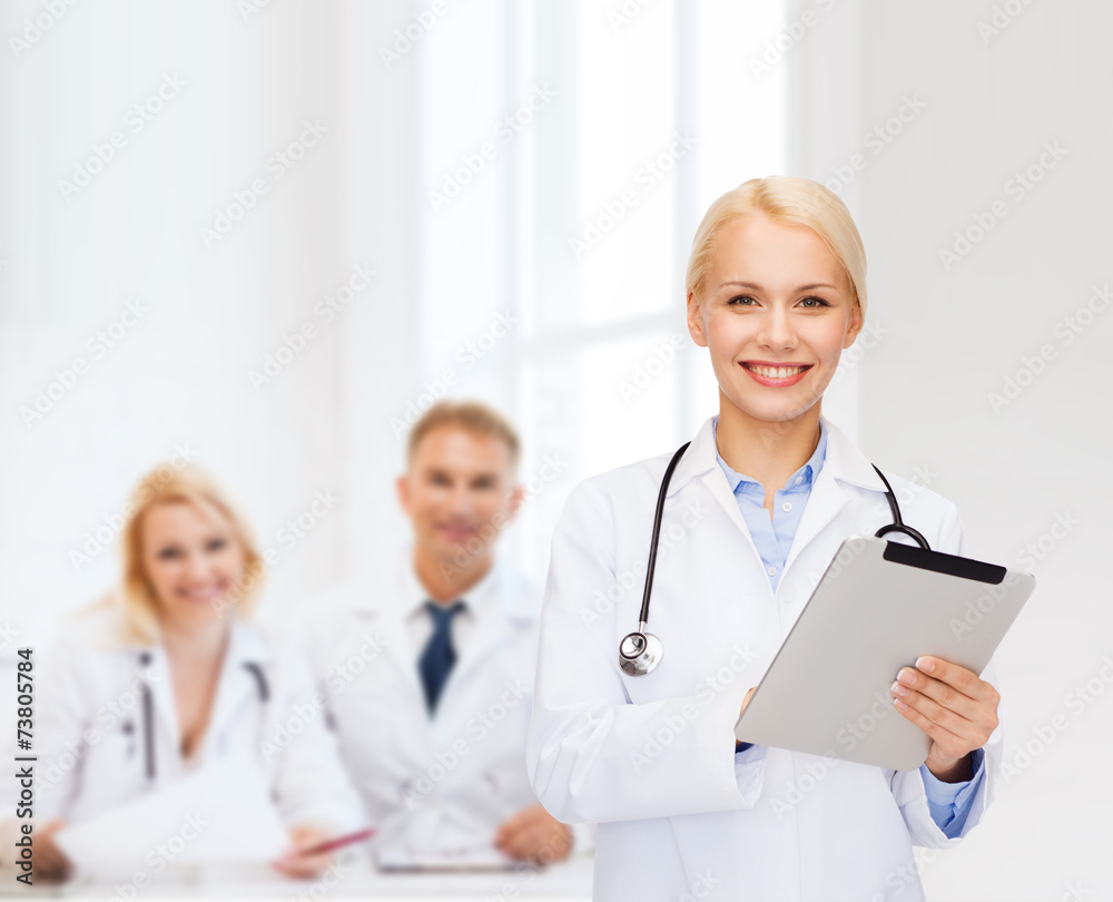 female doctor with stethoscope and tablet pc female doctor with stethoscope and tablet pc