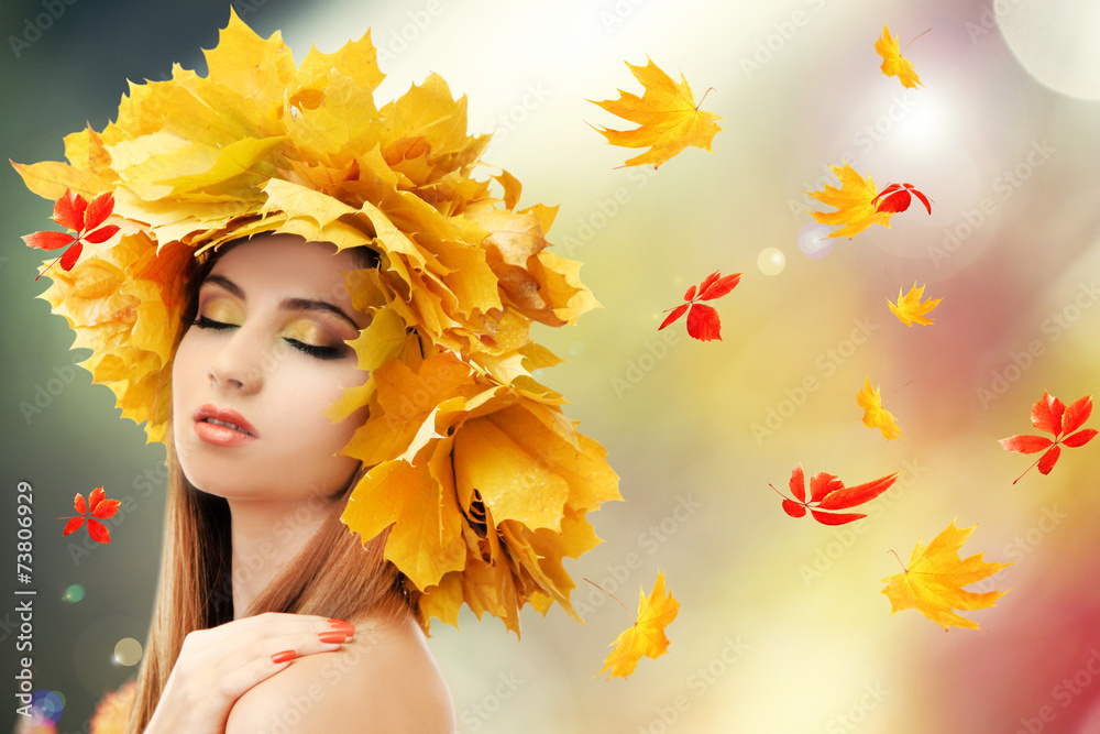 Beautiful young woman with yellow autumn wreath outdoors Beautiful young woman with yellow autumn wreath outdoors