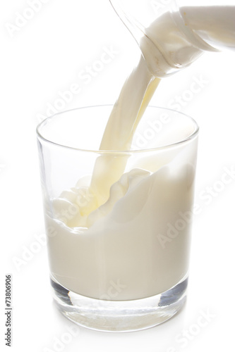 pouring a glass of milk