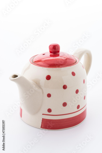 Polka dot tea pot isolated on white background