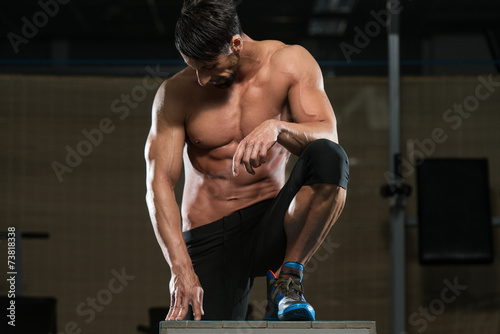 Athlete Resting After Performing A Box Jump