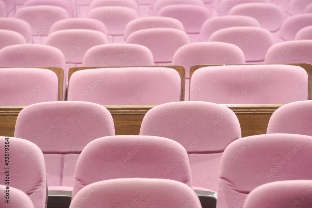 Fototapeta premium Empty movie theater with red seats
