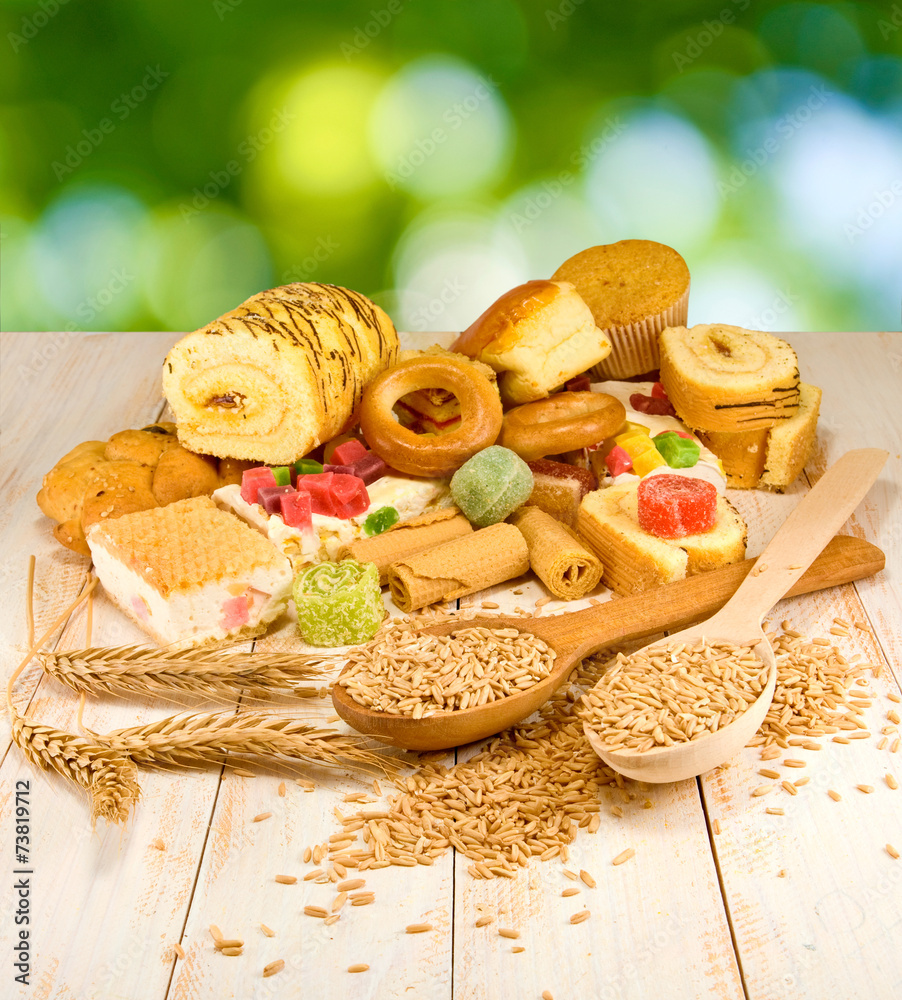 Fototapeta premium different cookies on the table on a green background