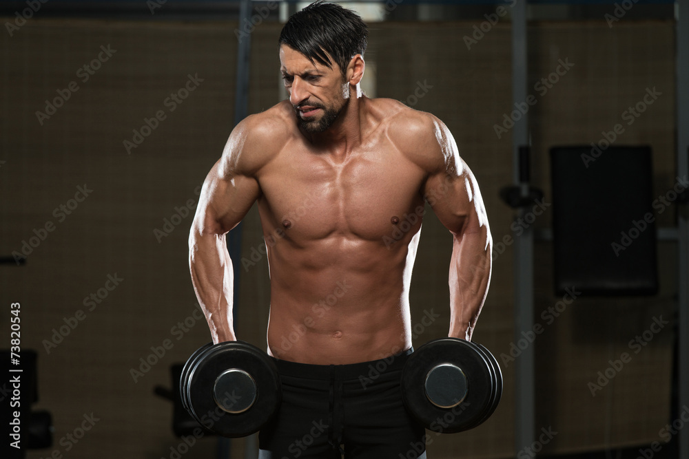 Fit Athlete Doing Exercise For Trapezius