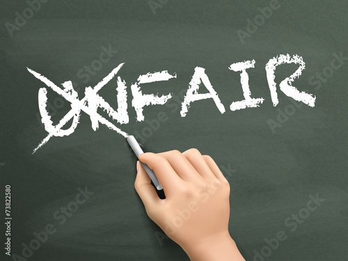 hand changing the word unfair into fair