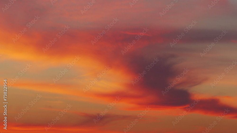 Time lapse shot of the morning sunrise through the clouds Time lapse shot of the morning sunrise through the clouds