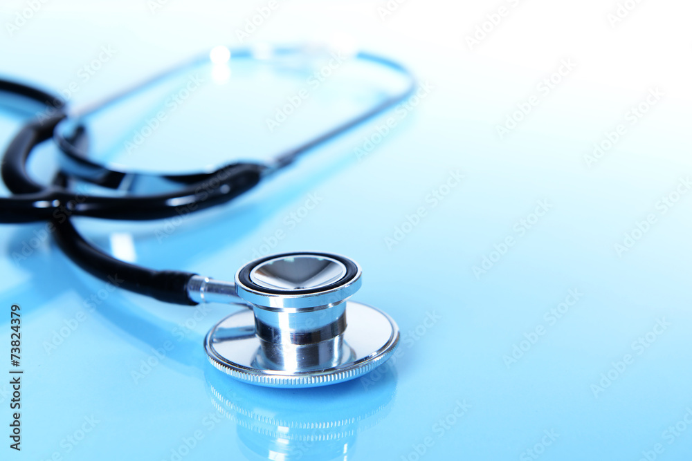 Stethoscope on light blue background Stethoscope on light blue background