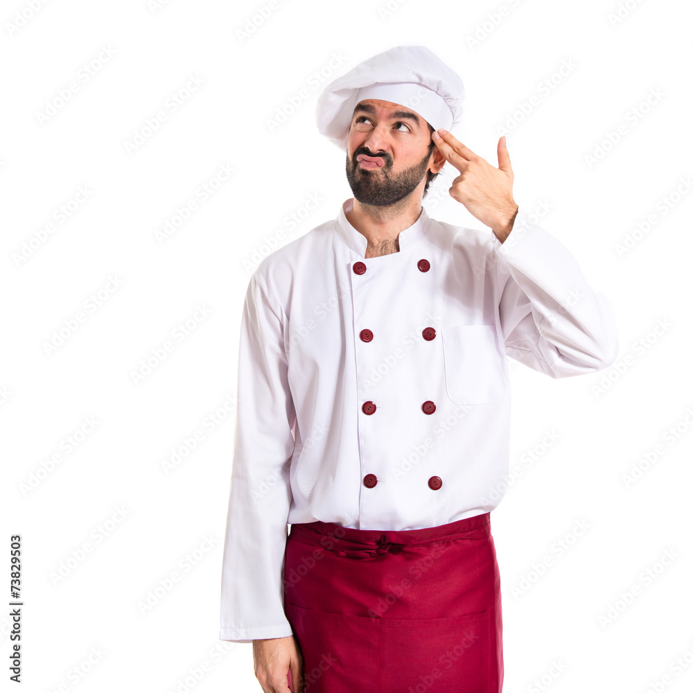 Chef making suicide gesture over white background Chef making suicide gesture over white background