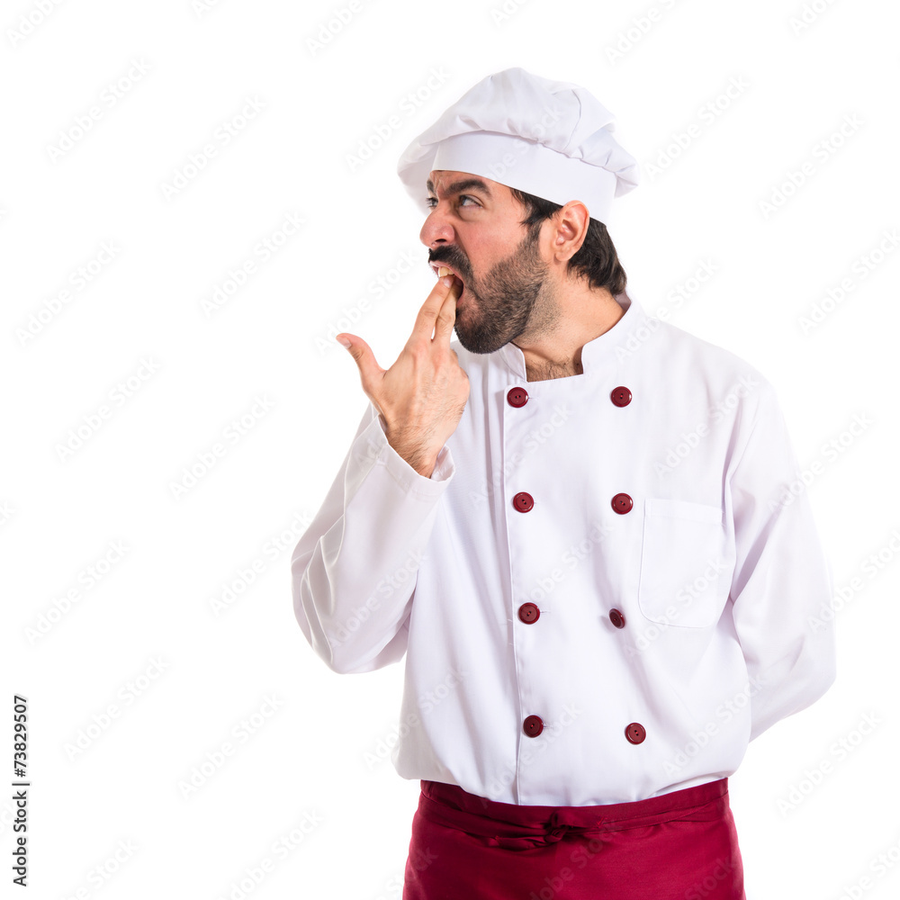 Chef making suicide gesture over white background Chef making suicide gesture over white background