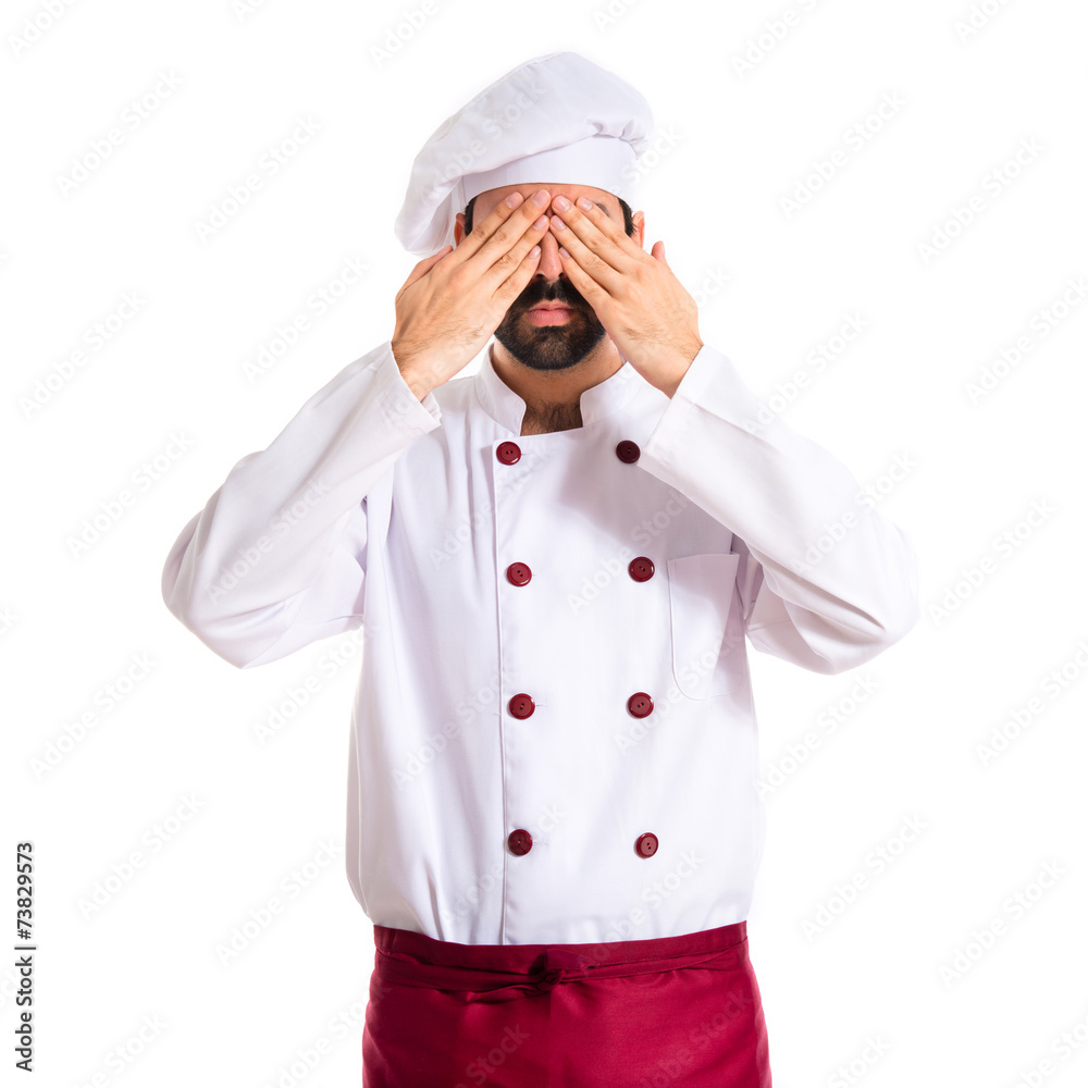 Chef covering his eyes over white background Chef covering his eyes over white background