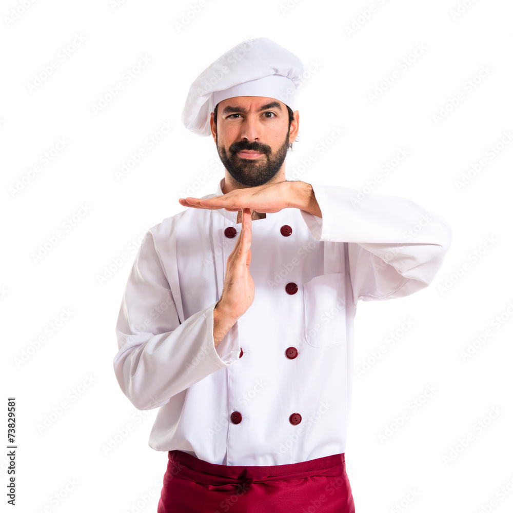 Chef making time out gesture over white background