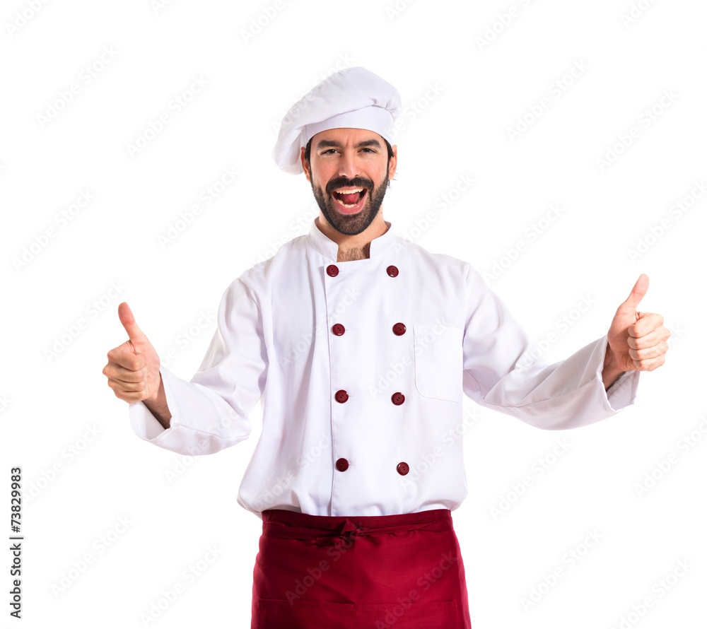 Chef with thumb up over white background Chef with thumb up over white background