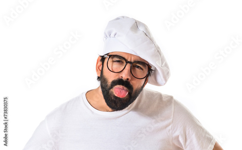 Chef doing a joke over white background
